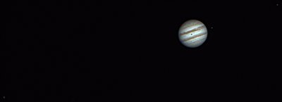 Jupiter with Ganymede, Europa (and shadow) and Io.