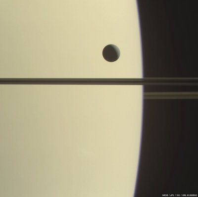 Dione before Saturn Val Klavans.jpg