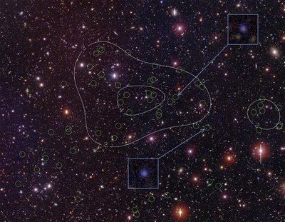The newly discovered protocluster of galaxies located in the Bootes field <br />of the NOAO Deep Wide-field Survey. Green circles identify the confirmed <br />cluster members. Density contours (white lines) emphasize the concentration <br />of member galaxies toward the center of the image. The patch of sky shown <br />is roughly 20′ x 17′ in size. Credit: Dr. Rui Xue, Purdue University.