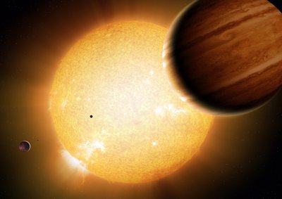 An artist’s portrayal of a Warm Jupiter gas-giant planet in orbit <br />around its parent star, along with smaller companion planets. <br />Image credit: Detlev Van Ravenswaay/Science Photo Library