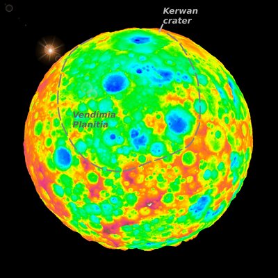 The top of this false-color image includes a grazing view of Kerwan, Ceres’ <br />largest impact crater. This well-preserved crater is 280 km (175 miles) wide <br />and is well defined with red-yellow high-elevation rims and a deep central <br />depression shown in blue. Kerwan gradually degrades as one moves toward <br />the center of the image into an 800-km (500-mile) wide, 4-km (2.5-mile) <br />deep depression (in green) called Vendimia Planitia. This depression is <br />possibly what’s left of one of the largest craters from Ceres’ earliest <br />collisional history. (Credit: SwRI/Simone Marchi)