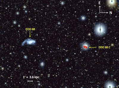 This visible-light image taken with the Large Binocular Telescope shows dwarf <br />galaxy DDO 68, which lies in a comparatively &quot;empty&quot; region of space 39 <br />million light-years from Earth, and one of its companion objects, DDO 68 C. <br />The scale bar indicates a distance of 3.6 kiloparsecs, or just under 12,000 <br />light-years.  (Credit: Francesca Annibali/INAF)