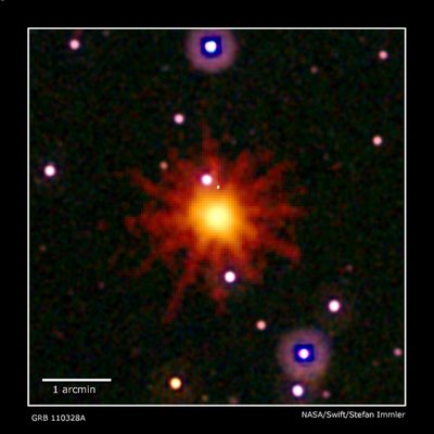 Images from Swift's Ultraviolet/Optical (white, purple) and X-ray telescopes<br />(yellow and red) were combined in this view of GRB 110328A. The blast was<br />detected only in X-rays, which were collected over 3.4 hours on March 28.<br />(Credit: NASA/Swift/Stefan Immler)