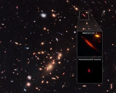 Galaxy Cluster MACS J2129-0741 and Lensed Galaxy MACS2129-1<br />Science: NASA, ESA, and S. Toft (University of Copenhagen)<br />Acknowledgment: NASA, ESA, M. Postman (STScI), and the CLASH team