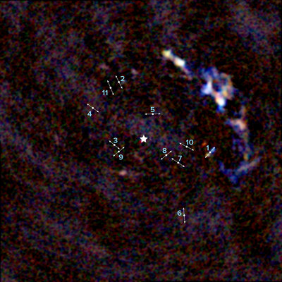 ALMA image of the center of the Milky Way galaxy showing the location of 11 young <br />protostars within about 3 light-years of our galaxy's supermassive black hole. The <br />lines indicate the direction of the bipolar lobes created by high-velocity jets from the <br />protostars. The illustrated star in the middle of the image indicates the location of <br />Sgr A*, the 4 million solar mass supermassive black hole at the center of our galaxy. <br />Credit: ALMA (ESO/NAOJ/NRAO), Yusef-Zadeh et al.; B. Saxton (NRAO/AUI/NSF)