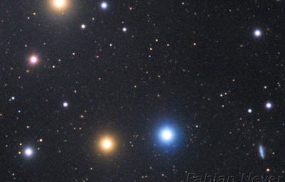 Blue galaxy near blue star HD 106420 in M106 field Image Fabian Neyer.png
