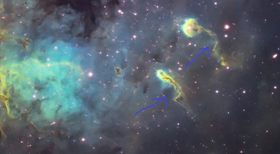 Cosmic tadpoles with arrows.png