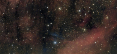 Blue reflection nebula around HD 198480.png