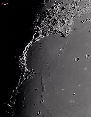 Sinus Iridum – The Bay of Rainbows. In this image clearly showing its classical Jewelled Handle, comprising an illusionary setting for 5 gemstones, only visible for a few short hours each month when the terminator passes over the basin.  The low sunlight illuminates the Jura mountains with a Clair-Obscure effect at 2 days after first quarter setting the valleys in deep shadow while highlighting the prominent peaks creating the visual effect of a Jewelled Handle. It is a highly prominent and imposing feature which stands out against a background of darkness which is difficult to image correctly while retaining the low Dorsa wrinkled wave like features within the bay that also come to prominence at this time.                                                                                                        Another hugely important and stand out feature of this image is the “Moon Maiden” first brought to prominence by the Italian astronomer Giovanni Cassini in a drawing published in 1679. “She” can be seen in the structure of the Promontorium Heraclides overlooking the peaceful bay. (to best view the Maiden, rotate the image 90 degrees counter clockwise).                                                                                Other standout features are the Promontorium Laplace, the small crater Laplace A at the entrance to the bay and the crater Bianchini in deep shadow on the crest line of the Montes Jura. To the right of the image are the craters Helicon and Le Verrier.<br />Equipment used.<br />Skymax 180/2700 Mak-Cas. ASI294 CM Pro. imaged with Sharpcap in SER format with a capture area of 1024x768 5000 frames 24/sec no guiding. iOptron CEM 60 mount. 20% stacked in AutoStakkert 3 processed in Photoshop.<br />Imaged at 19:00 CET 22/02/2021 Torrevieja Spain.