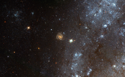 3 armed background galaxy in M101 APOD November 27 2021.png