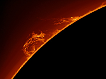 &quot;Fire Eating Dragon&quot;  All images were taken with an AP (Astro-Physics) 152mm F8 Starfire refractor stopped down to 102mm.  A TeleVue 2.5x PowerMate was then used to increase the F ratio further to F30.  A Point Grey Research FLE-3 video camera was used to take 3000 frames at 76 frames per second.  800 images were stacked and processed in Registax 6 and color added in PhotoShop.
