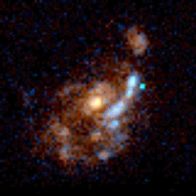 An image taken by the Hubble Space Telescope of a luminous distant <br />galaxy disrupted by a merger. A new study of 2084 distant, luminous <br />infrared galaxies finds that, contrary to some earlier results, there is <br />no strong evidence that most are not in a merger process. <br />(Credit: NASA/Hubble/Richard Griffiths (JHU))