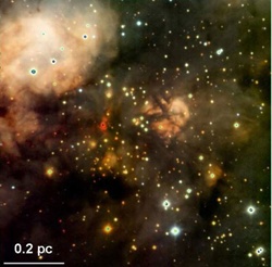Tricolor composite image of W3 Main where massive stars are being born. National Astronomical Observatory of Japan