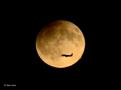 eclipse with plane.jpg