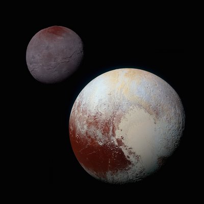 Pluto, shown here in the front of this false color image, has a bright ice <br />covered &quot;heart.&quot; The left, roughly oval lobe is the basin provisionally named <br />Sputnik Planitia. Sputnik Planitia appears directly opposite Pluto's moon, <br />Charon (back). Credit: NASA/JHU APL/SwRI