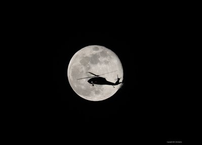 Moon and Black Hawl Helicopter.jpg