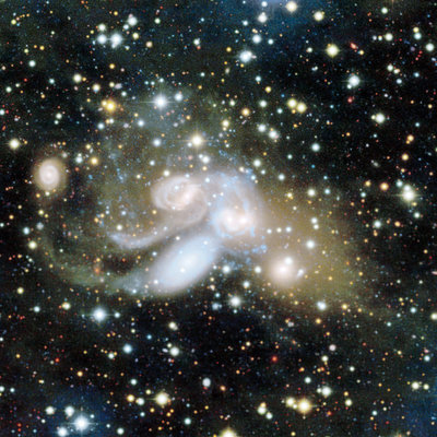 Zoom on Stephan's Quintet in true colors as featured in the CFHT/Coelum <br />2018 calendar. NGC 7317 is the lower right member of the group. <br />Credit: CFHT/Coelum, Jean-Charles Cuillandre &amp; Giovanni Anselmi