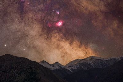 Lagoon Nebula Rising above snowcap