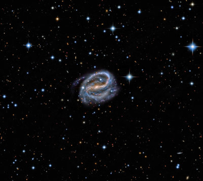 NGC 7479_S1_Levels_Curves_Shadows_HVLG_CBS_LHE2_HPF2_RN_Noise_GE_SS_Curves_HVLG_CBH_Crop_Cyan40_Desat.jpg