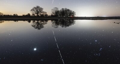 ISS-Lighttrail-Reflection_invert.jpg
