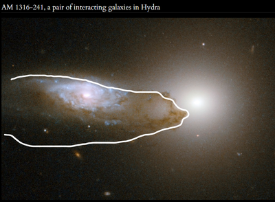Shape of spiral galaxy in front of elliptical galaxy.png