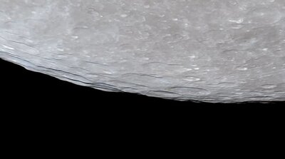 Bumpy edge of full moon
