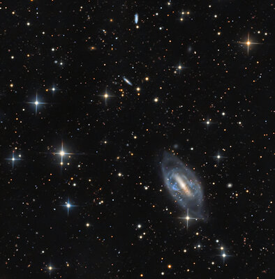 NGC2685_S1_Crop_GE_HVLG_LHE1_Levels_CurvesLow_Sat15_SS2083_SS2083_SCRed_CBHRed.jpg