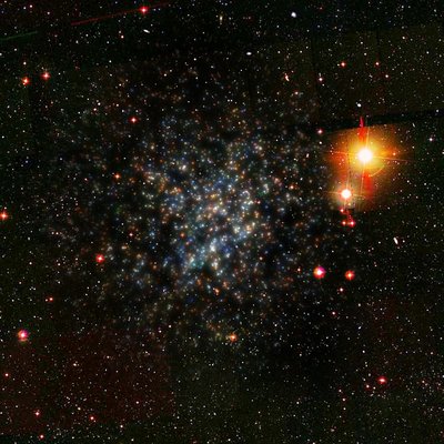 The Bootes dwarf galaxy (center of the image) is one of the 21 known satellite <br />galaxies orbiting the Milky Way and used in this study. It is about 200,000 <br />light-years from the center of the Milky Way and its luminosity equals that of <br />100,000 Suns. In this image, the stars belonging to the dwarf galaxy were <br />enhanced so as to help in distinguishing them from the galactic foreground, <br />composed of nearby Milky Way stars. (© V. Belakurov / SDSS Collaboration)